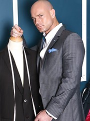 Sexual hunky boss posing before mirror
