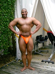 Muscle Hung is a dark, muscular man with a matching thick black cock