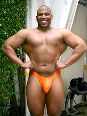 Muscle Hung is a dark, muscular man with a matching thick black cock