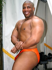 Muscle Hung is a dark, muscular man with a matching thick black cock