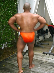Muscle Hung is a dark, muscular man with a matching thick black cock