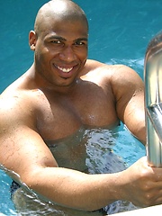 Muscle Hung is a dark, muscular man with a matching thick black cock