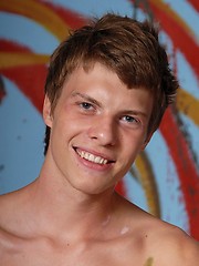 Smiley young decorator playing in studio
