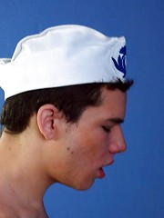 Naked guy in a sailor cap bounces on a young boner