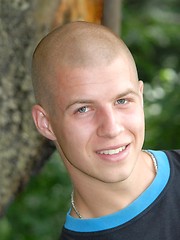 Nice looking bald guy showing his naked body
