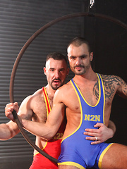 Two lycra gays have anal in circus decoration
