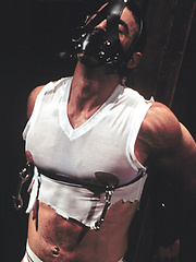 Bondaged hunk gets nipple and cock torture