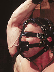 Bondaged hunk gets nipple and cock torture