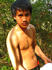 Handsome Thai guy gets naked in the wild
