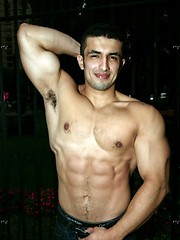 Muscled latin man posing