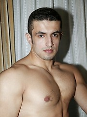 Muscled latin man posing