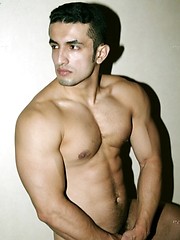Muscled latin man posing