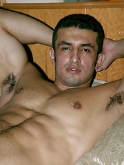 Muscled latin man posing
