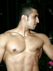 Muscled latin man posing