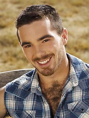 Smiley cowboy man showing his nude hairy chest
