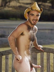 Smiley cowboy man showing his nude hairy chest