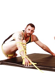 Muscle daddy hunks in spandex suits sucking and fucking each other